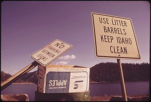 Photo of sign by Coeur d'Alene Lake taken in May of 1973: "Use Litter Barrels Keep Idaho Clean"